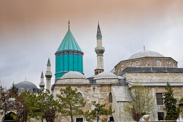 Fototapeta na wymiar Minarets and domes of Camii Selimiye (Selimiye Mosque) and the blue tiled tower of the Mevlana Museum, Konya, Turkey