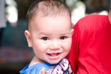 close-up photo of a smiling child