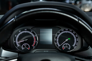 Car dashboard with white  backlight: Odometer, speedometer, tachometer, fuel level, water...