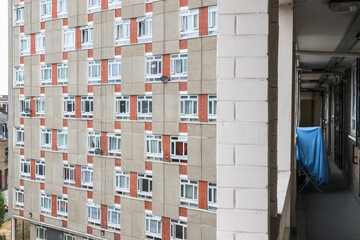 Facade of a concrete tower block George Loveless House in the Dorset Estate in east London