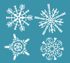 Beautiful set white snowflakes on a blue background for winter design. Collection of Christmas New Year elements. Frozen silhouettes of crystal snowflakes. Modern design apartment. Holiday wallpapers.