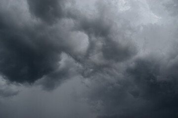 Cumulonimbus cloud formations on tropical sky , Nimbus moving , Abstract background from natural phenomenon and gray clouds hunk , Thailand	