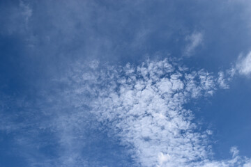 Altocumulus cloud on beautiful blue sky , Fluffy clouds formations at tropical zone	