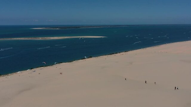  Paragliders fly over the Dune of Pilat Dune du Pilat , Arcachon, France. Largest sand dune in Europe.