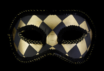 Black & Gold Harlequin Masquerade Mask Isolated Against Black Background