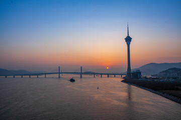 Fototapeta na wymiar Sai Van bridge and Macau Tower at Sunset, Macau