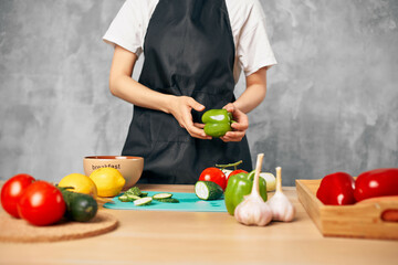 Woman in black apron Cooking healthy eating diet