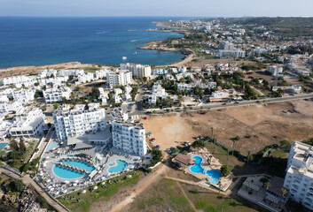 Naklejka na ściany i meble Aerial drone photograph of fig tree bay beach. Summer vacations cyprus.
