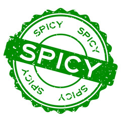 Grunge green spicy word round rubber seal stamp on white background