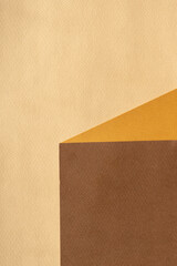 Abstract background with imitation of a stand for products. Chaotic intersection of orange, brown and beige colors.Vertical background image