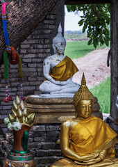 Nakhon Nayok, Thailand - Mar 21, 2020 : Buddha statue at The ancient of a 200 year old church. Wat Pah Krathum. Selective focus.