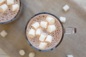 Homemade Hot Chocolate with Mini Marshmallows, top view. Flat lay, overhead, from above.