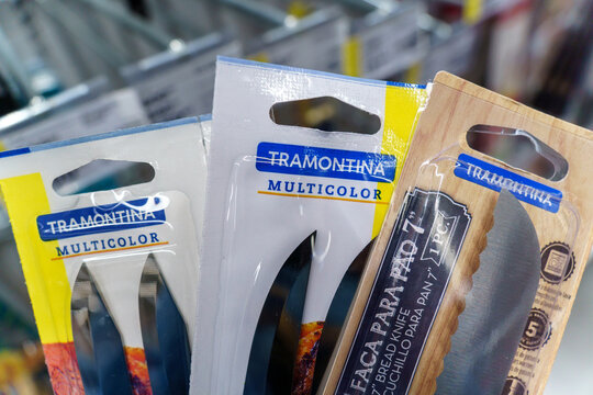 Volzhsky, Russia-September 21, 2021: Tramontina knives in the buyers hand. Selective focus