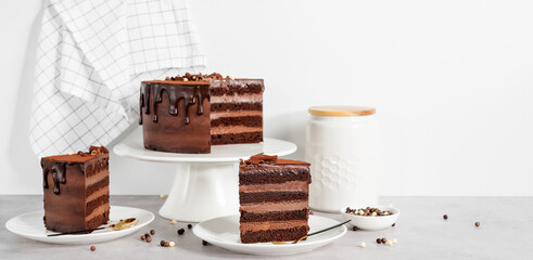 Super chocolatey cake  with dark Belgian chocolate  with ganache cream and chocolate glaze drips.