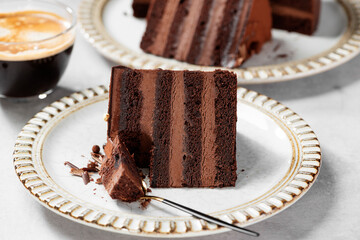 Super chocolatey cake  with dark Belgian chocolate  with ganache cream and chocolate glaze drips.