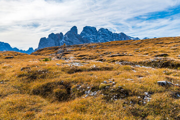 Autumn panorama on Monte Piana. View from the trenches to the three peaks of Lavaredo. Dolomites.