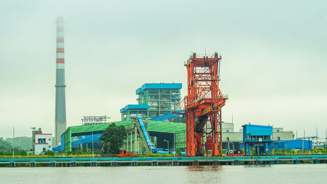 Huge Crane In Front Of Power Plant At Mahakam Riverbank, Kutai Kartanegara, Indonesia