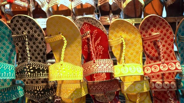 Colorful Indian tradition footwears at street shop