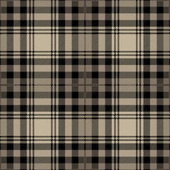 Khaki beige and black tartan plaid. Scottish pattern fabric swatch close-up. 