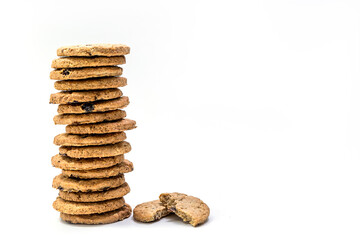 Close up delicious homemade milk cookie or biscuit with Raisin stack - isolated on white background with clipping path