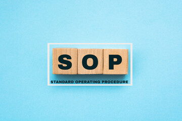 SOP - acronym from wooden blocks with letters, abbreviation SOP standard operating procedure...