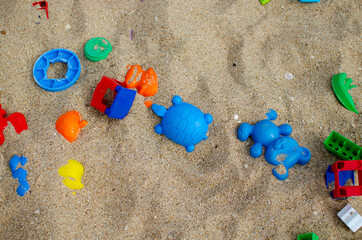 Sandbox. Plastic children's toys. Plastic molds for sand.