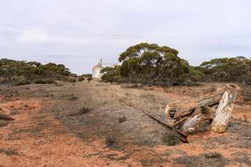 The end of a rail line at Kulwin in Victoria's Mallee region. A grain silo is still seen in the distance.