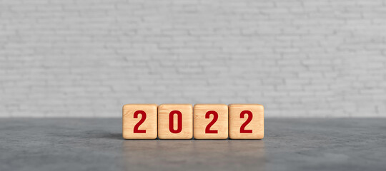 wooden cubes with message 2022 on concrete background - obrazy, fototapety, plakaty