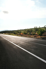 Empty straight road background in the evening