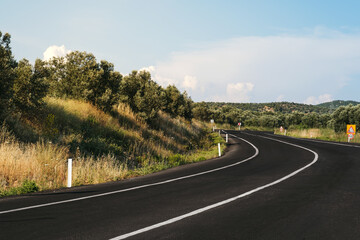 Fototapeta premium Bending road background on daylight.
