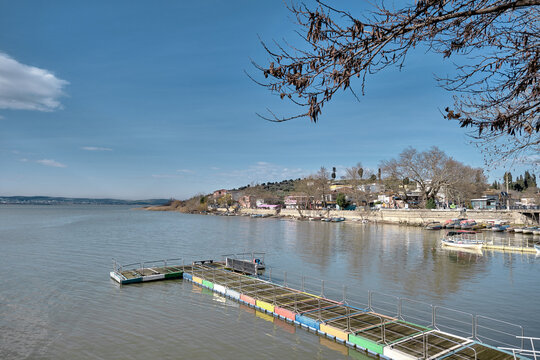Golyazi (Apolyont), uluabat lake, Bursa Turkey. Panoramic view of uluabat lake and small colorful port and town view with huge mountain backgrdun.