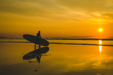 Surfer during the sunset