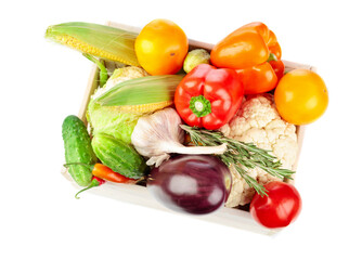 Various fresh vegetables isolated on a white background.