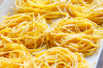 Italian Fettuccine dried pasta close up