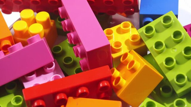 multi-colored blocks of children's designer. details of a educational game.