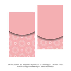 Business card template in pink with a luxurious white pattern for your contacts.