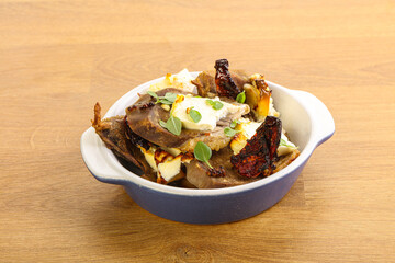 Baked pork tongue with cheese