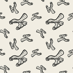 Drawn slingshots. Vector two-tone seamless pattern