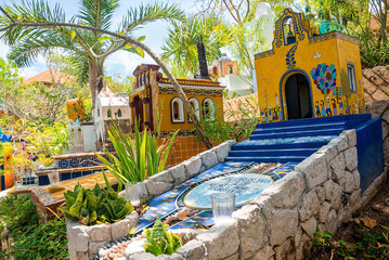 Multicolored catholic cemetery in Xcaret ecotourism park. Famous ecotourism and archaeological park