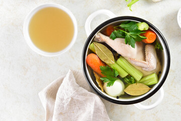 Chicken broth with vegetables and spices