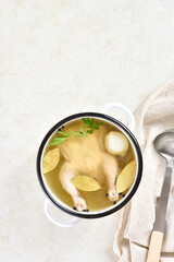 Chicken broth in pan