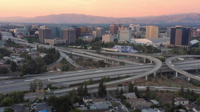 Aerial Hyperlapse Of The San Jose City Skyline And Freeway At Sunset