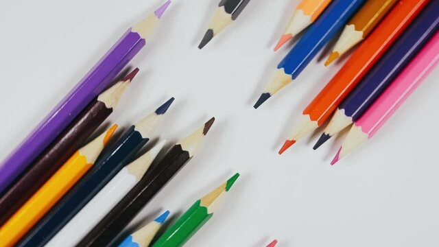 The felt pen spin rotate quickly fast fly, dispart, splash to the sides with centrifugal coriolis force. Top view, Flat Lay. The marker twist, create pattern, make design shape picture.