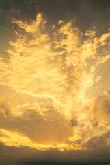 Colorful sunset sky with dramatic orange clouds. Only sky, no land.
