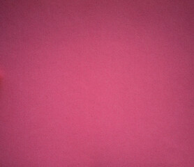 The texture of paper cardboard is pink. Pink background for greeting text.