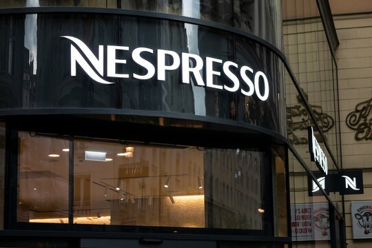The Nespresso caffeteria with a logo of a company where people may drink coffee