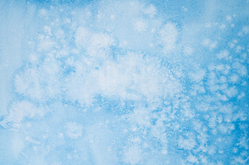 watercolor blue abstract art handmade diy painting on textured paper background. watercolour backdrop. painted frosty ice cold surface with cloud spots