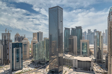 The Aerial view of westbay Doha Skyline in daylight, The West Bay is one of the most prominent...