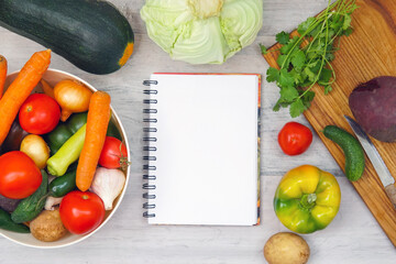 vegetables on the table. harvest. diet. And notepad. copy-book