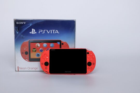 Bangkok, Thailand - March 14, 2021 : Sony PlayStation Vita Portable Neon Orange Edition With Box.